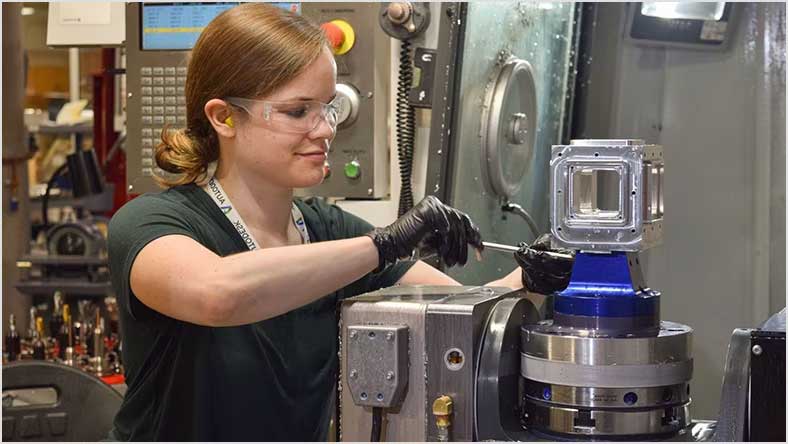 Student working on CNC machine