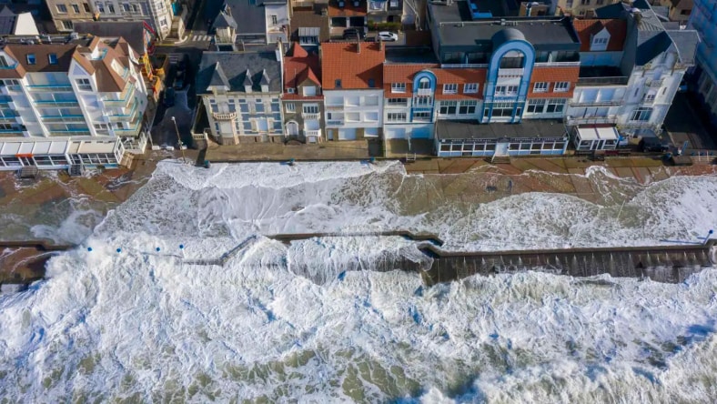 Carbon removal aerial shot of dike in France submerged by tides