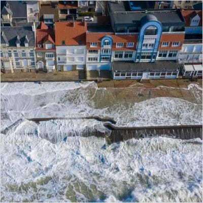 Carbon removal aerial shot of dike in France submerged by tides