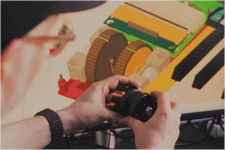 Native Instruments engineer interacting with electrical components