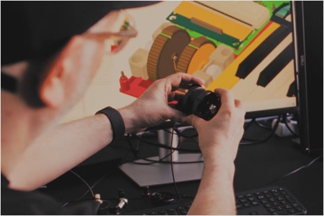 Native Instruments engineer interacting with electrical components