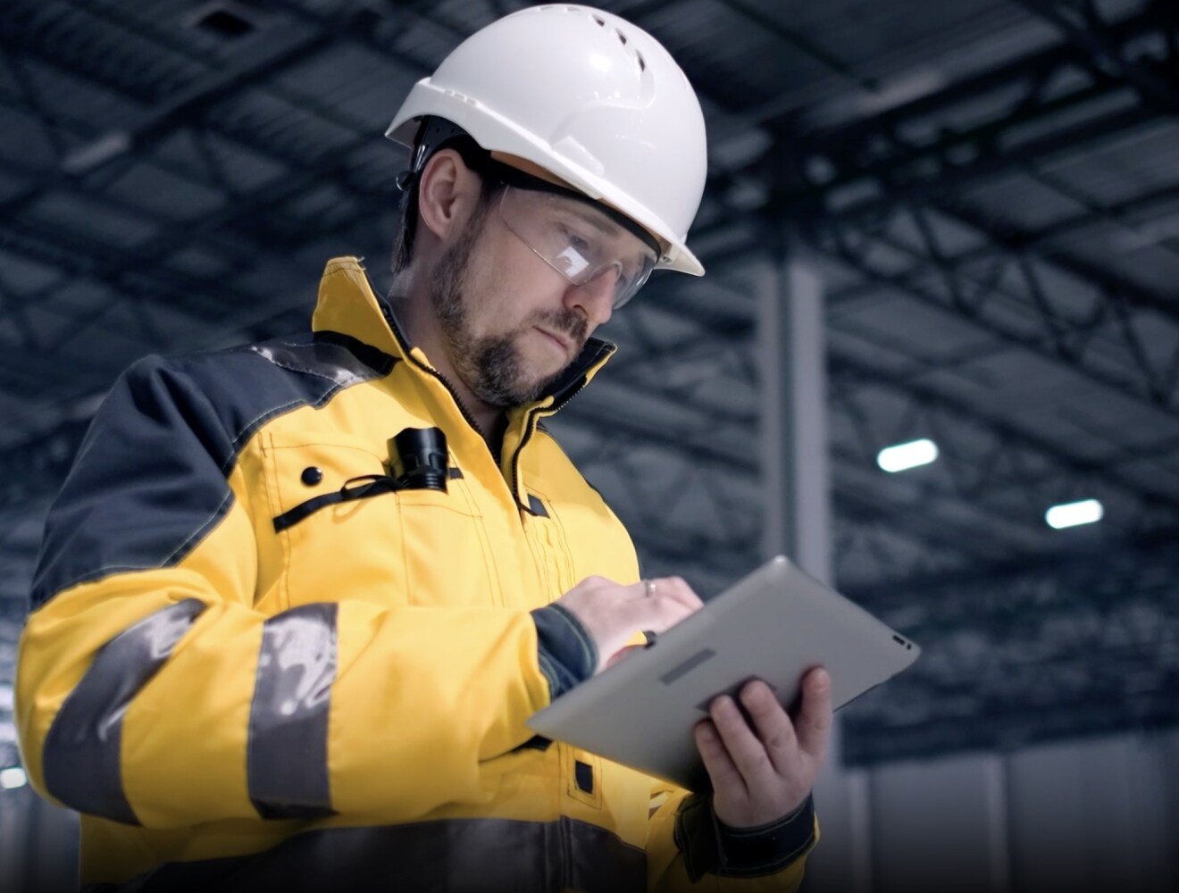 Image of Autodesk Prodsmart user, IG Masonry Support, using Prodsmart on their tablet to track operations.