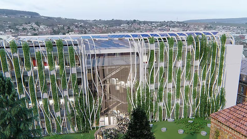 A biophilic building design features lush vegetation on the exterior.