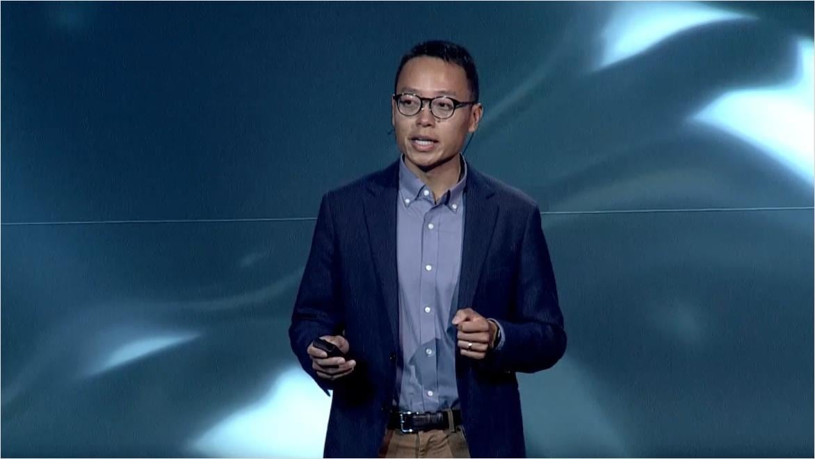 Dalton Ho, Regional Sustainable Design Leader at Perkins+Will, presents on stage at Autodesk University 2023.