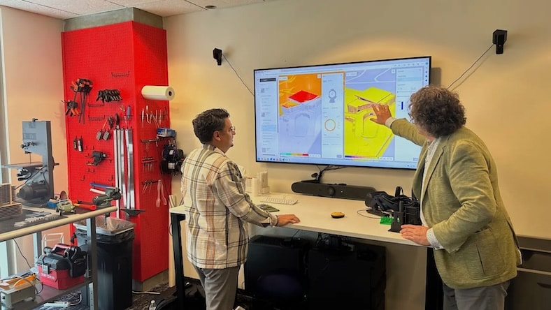 Team members at Baker Barrios Architects review a design in Forma.