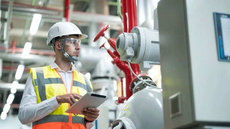 Architecture project management contractor on site working on MEP systems