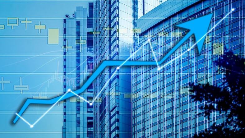 1044528938 An image of a building is superimposed with a chart showing financial gains.