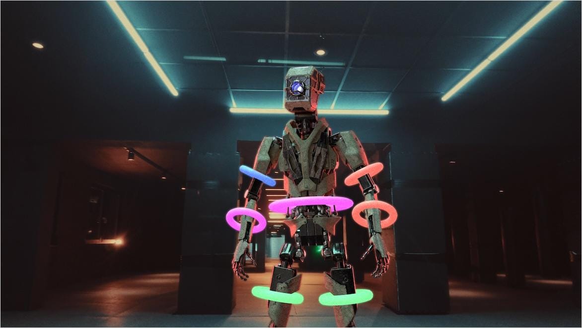 A scene generated using markerless motion capture shows a robot character with colorful donut markers around its limbs.
