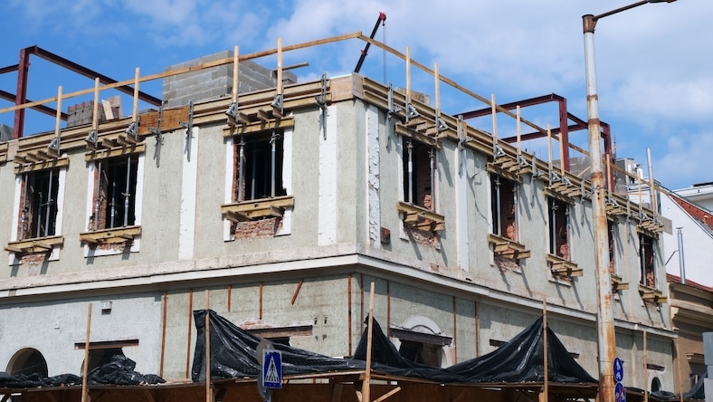 1400202955 A brick building is being retrofitted.