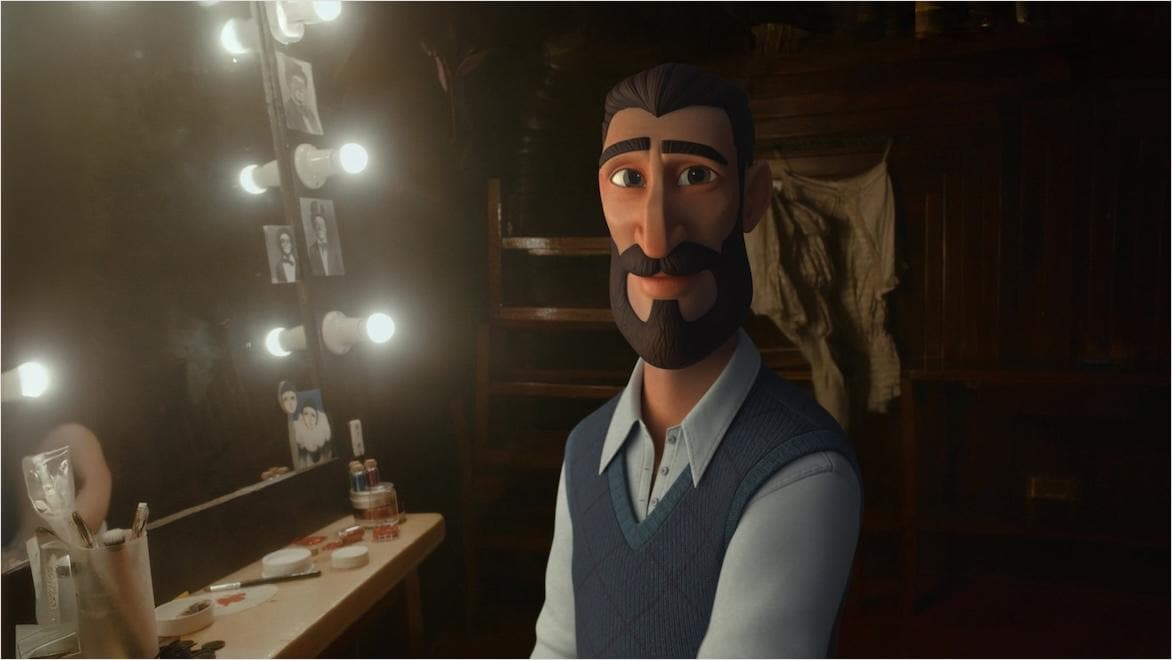 An animated character of a bearded man sits in front of a dressing room mirror and turns to face the viewer.