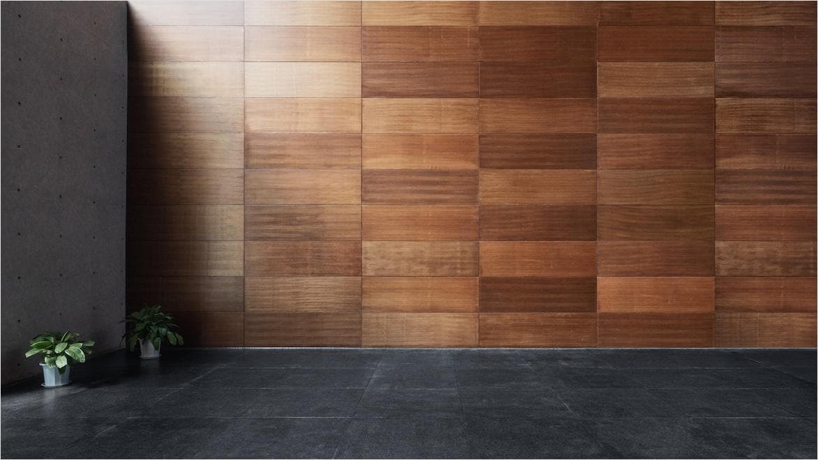 A large wooden wall in a modern office space.