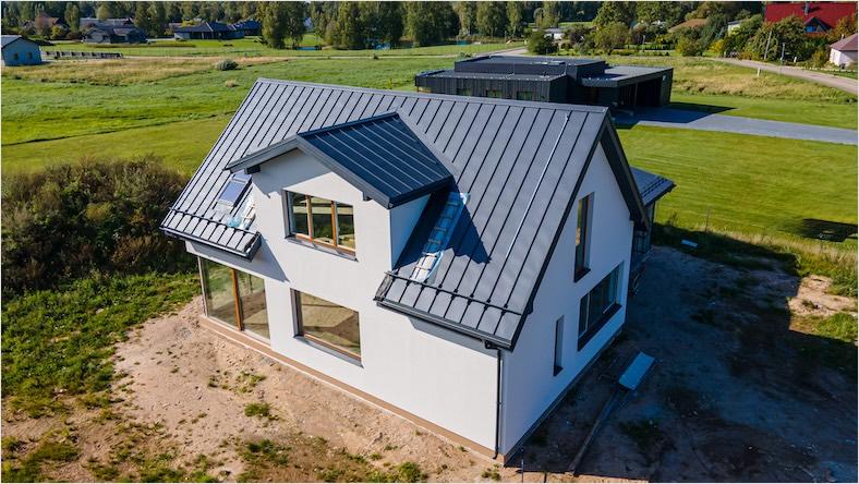 A pile of rebar sits in a warehouse.