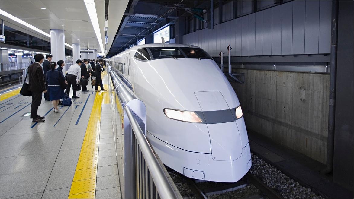 A bullet train arrives at a station in Tokyo, Japan.