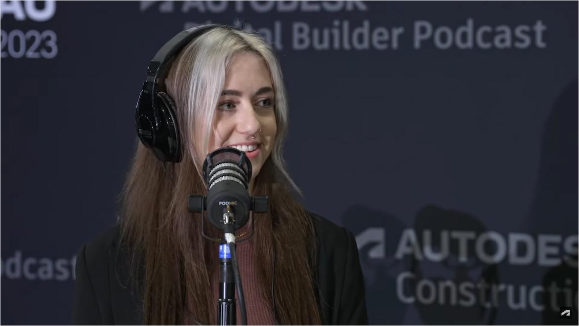 Ariana Cohn, Digital Construction Engineer at Timberlab, talks into a microphone on the Digital Builder Podcast.