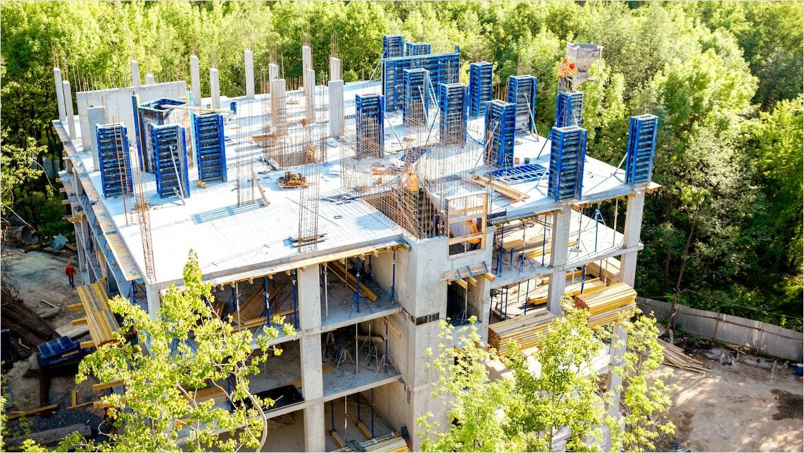 A structure is stripped to its foundation for retrofitting.