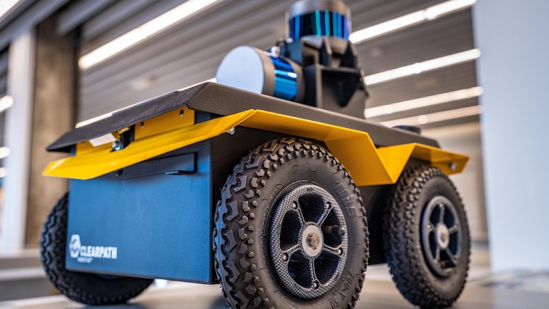 A wheeled robot inside a factory.