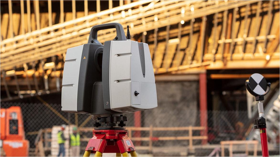 A laser scanner measures space on a construction site.