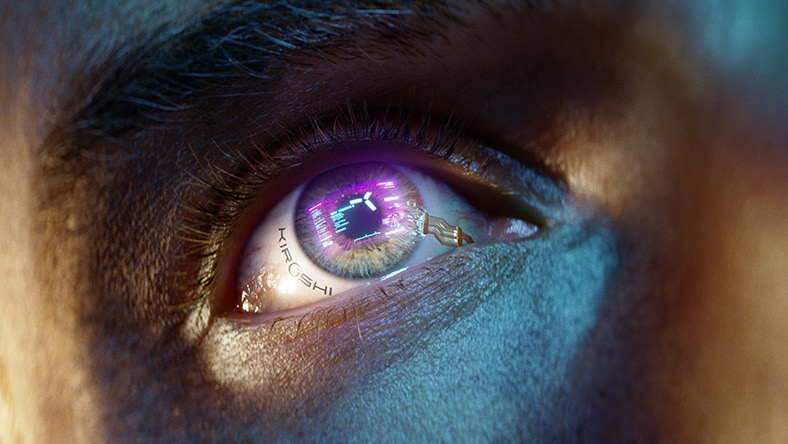 A rendering detail of a game character shows technology embedded in his eye.