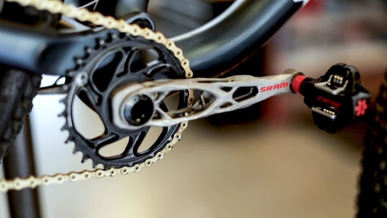 Close-up of the SRAM crankarm on a bicycle.