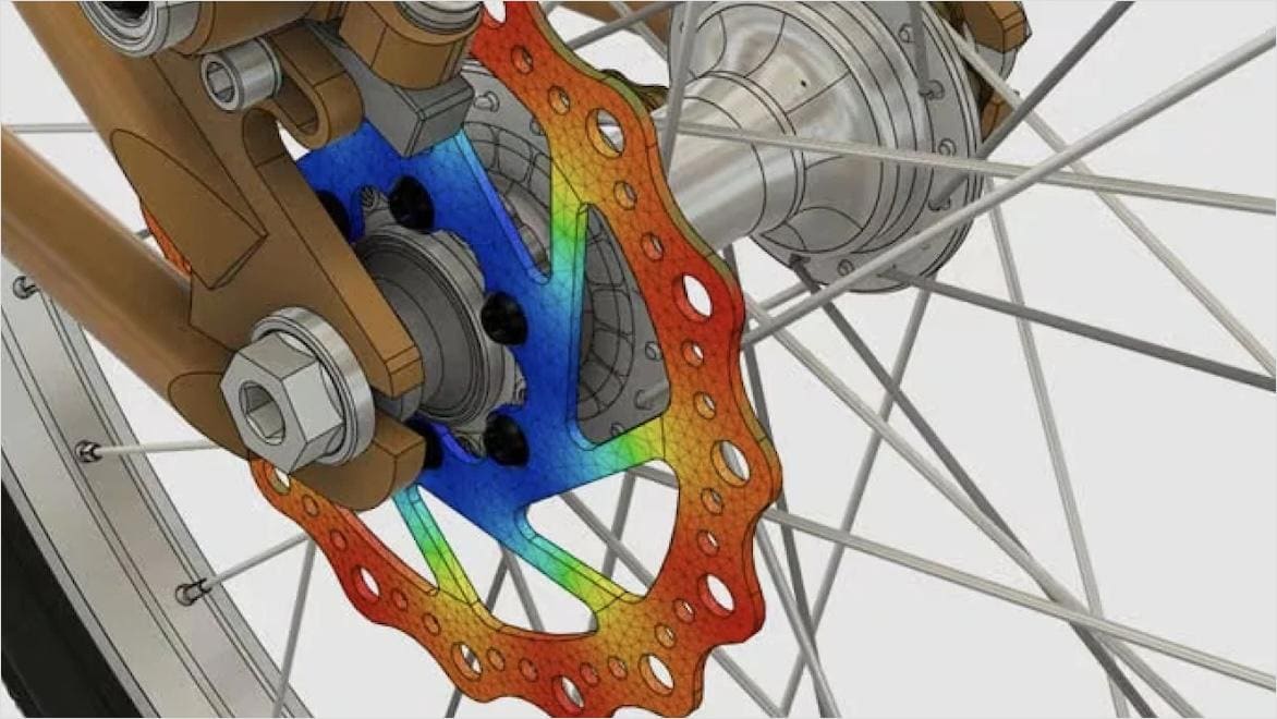 A 3D rendering of a bicycle wheel with different colors on the bracket from thermal stress simulation.