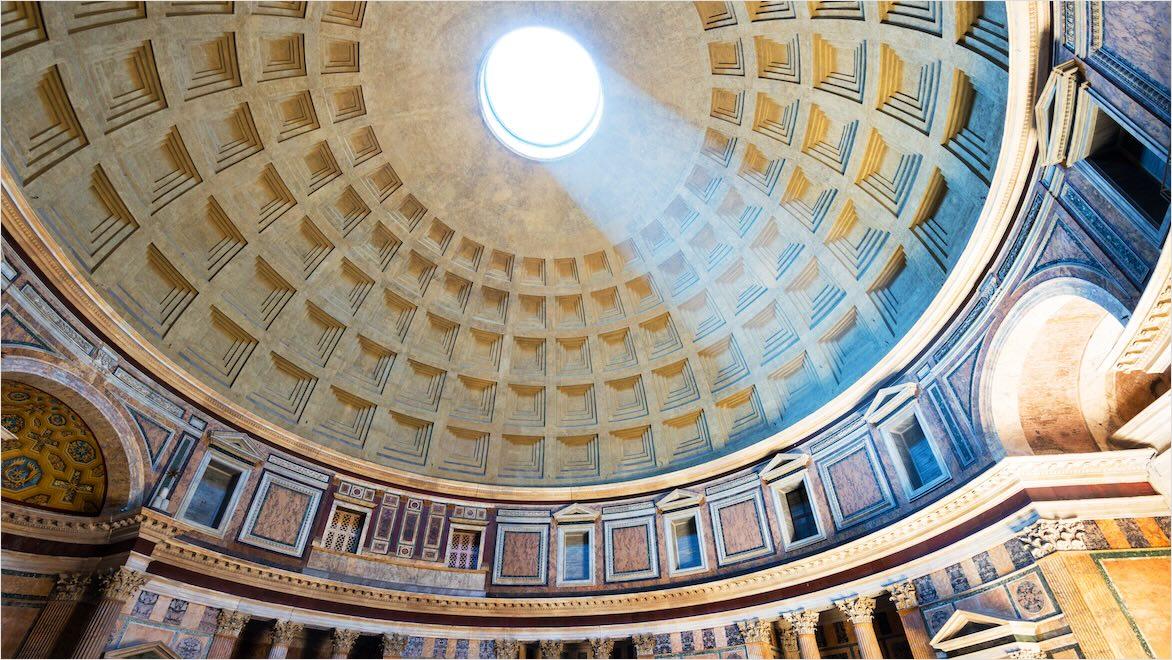 An interior image of the Pantheon shows light streaming from the ceiling oculus.