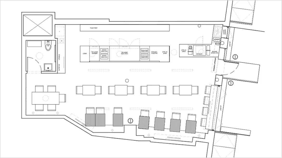 A cafe floor plan takes shape in space design software.