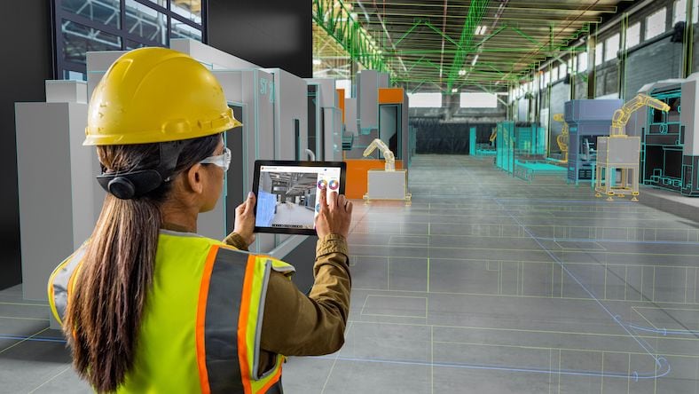Worker viewing a digital tablet at a construction site, with overlay.