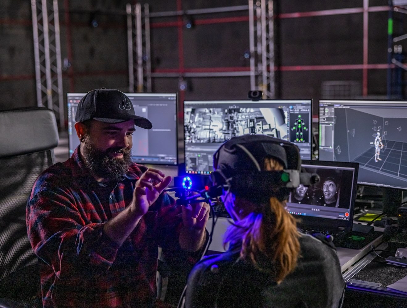 Two people working with motion capture technology.