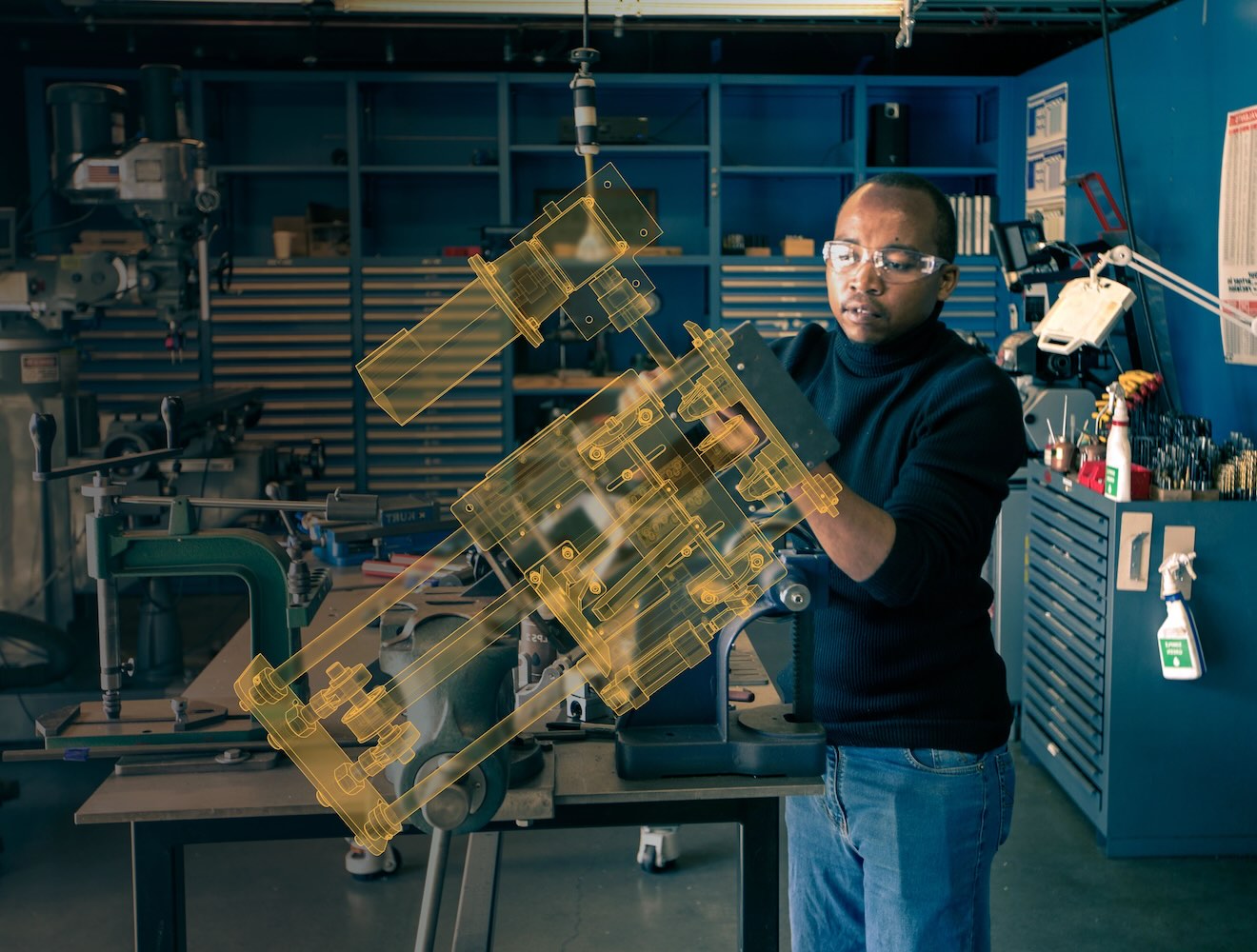Man works in a workshop with overlay.