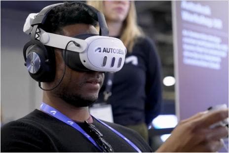 Person wearing VR headset and headphones