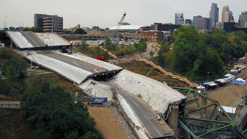 Debris scattered in the Mississippi River and at I-35 bridge collapse in Minneapolis, MN, August 2007