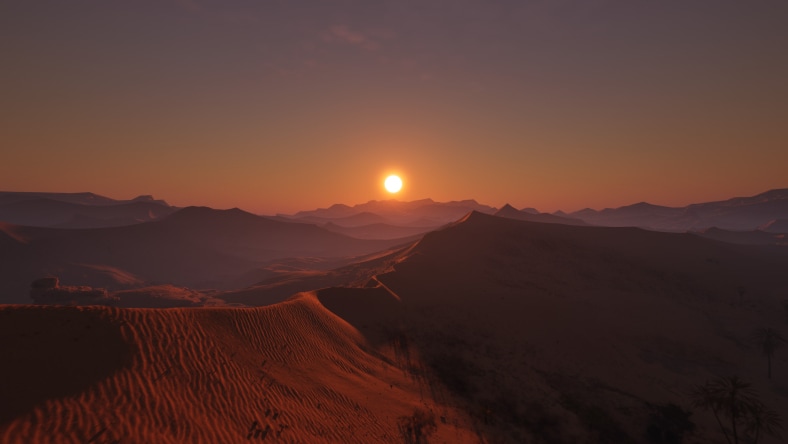 Sun sets in a sandy desert 
