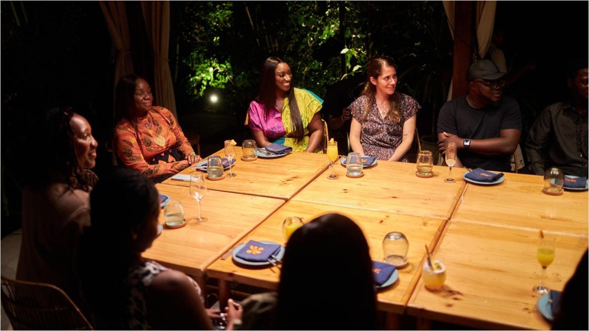 Autodesk Foundation Climate Adaptation & Resilience Investment Lead Beth Foster-Chao and SDS Africa Co-Founder Mandy Nyarko engage with the SDS Africa team over dinner.