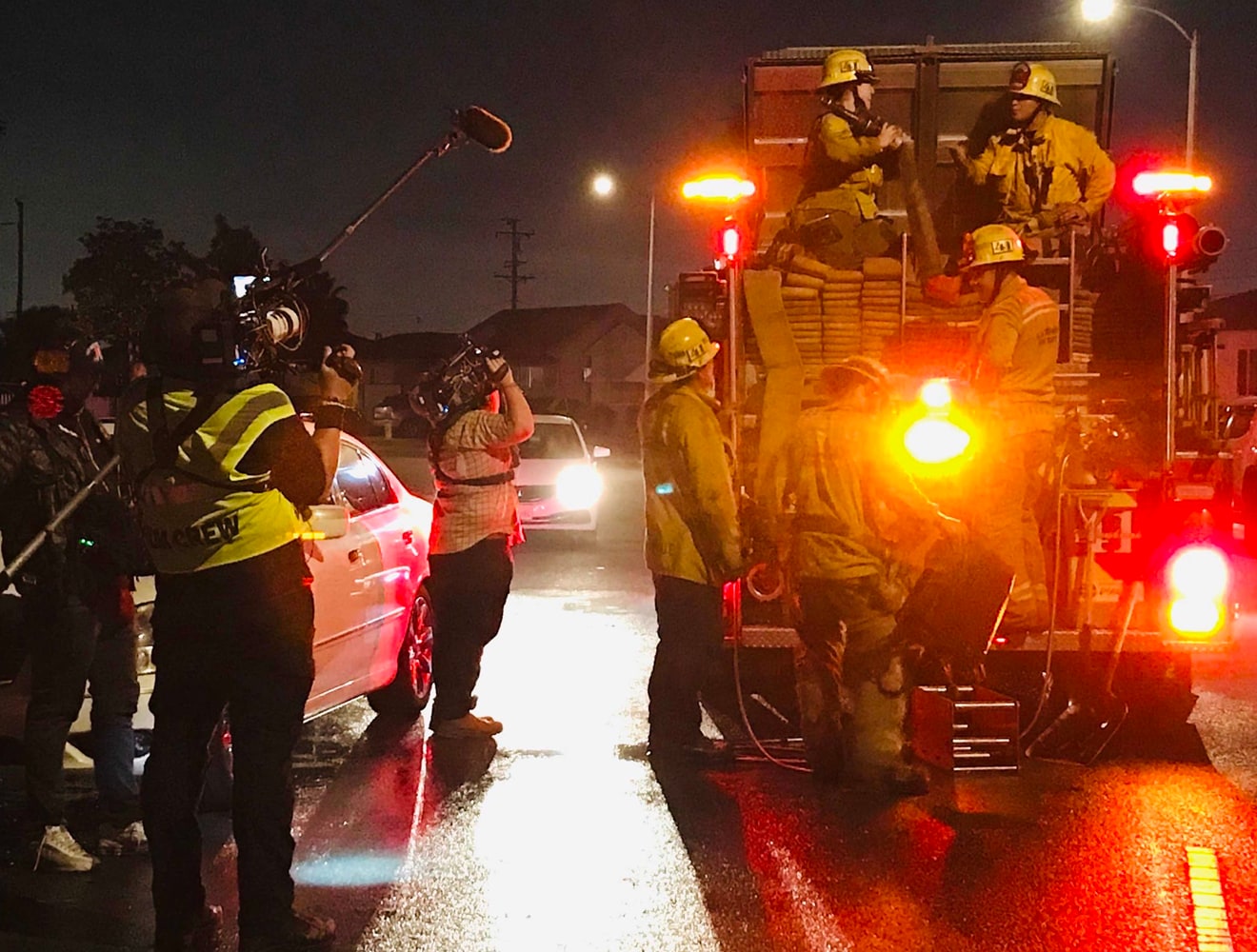 Film crew capturing first responders.