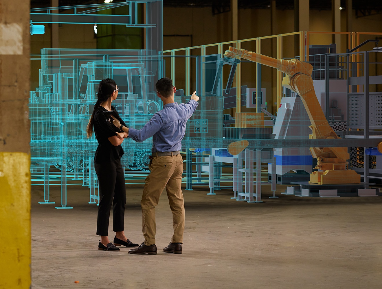 两名生产工程师穿过工厂，查看机器人和生产系统