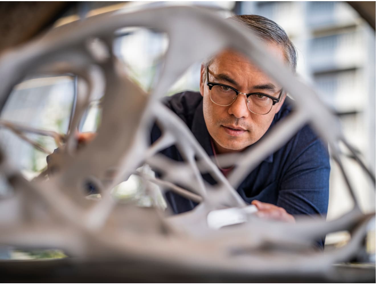 educator observes generative design object