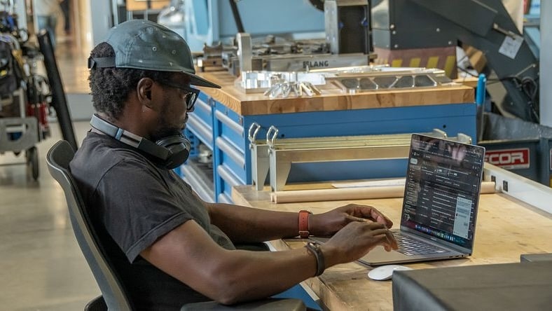 Man working in the CNC Machine Shop at the Autodesk San Francisco Technology Center.