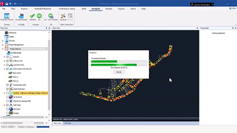 An InfoDrainage user interface, where the user is retrieving hydraulic results from a catchment model. Loading bars show the process is partway to completion. 