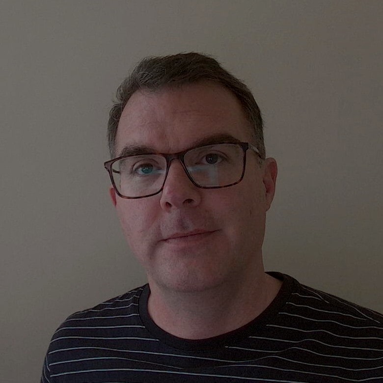 headshot of Geoffrey Brennan