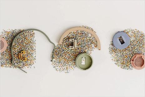 Components of headphones laying on table