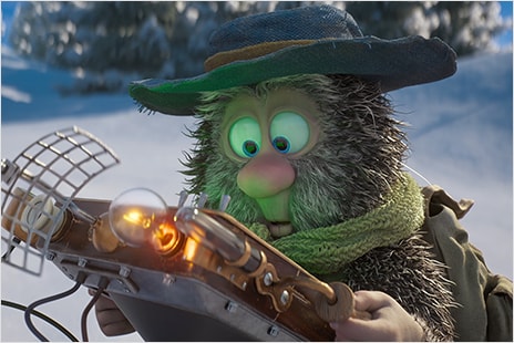 Fuzzy character wearing a hat looking at a device with light bulb