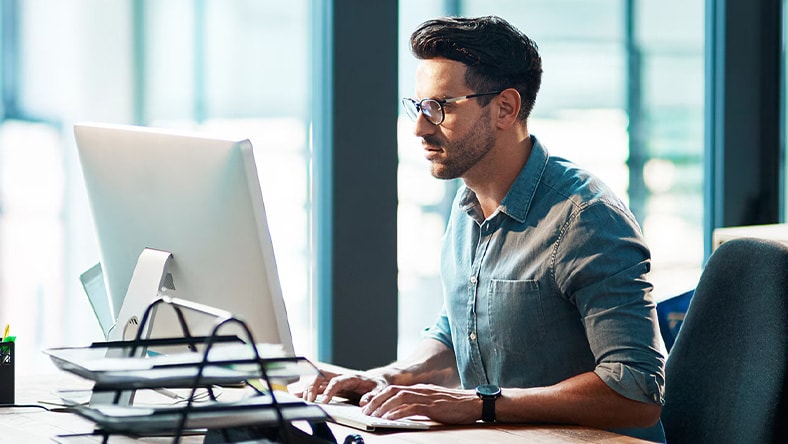 Engineer looking at a computer.