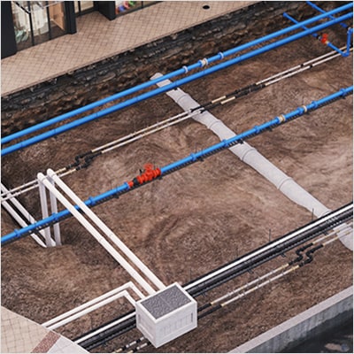 Graphic showing a water distribution network as it appears underground