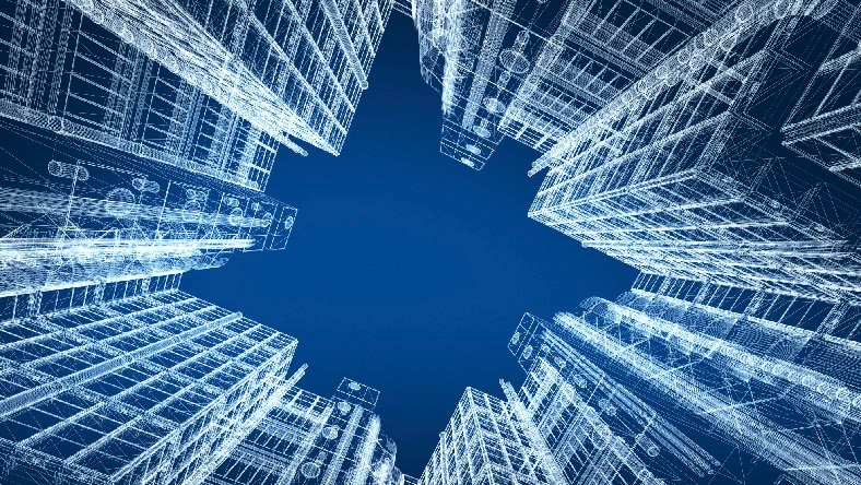 A conceptual rendering of modern buildings, looking upward with blue sky between them.