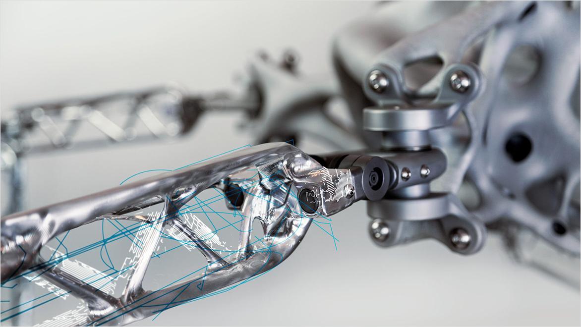 A blue wireframe overlay appears over metal parts for a mechanical object.