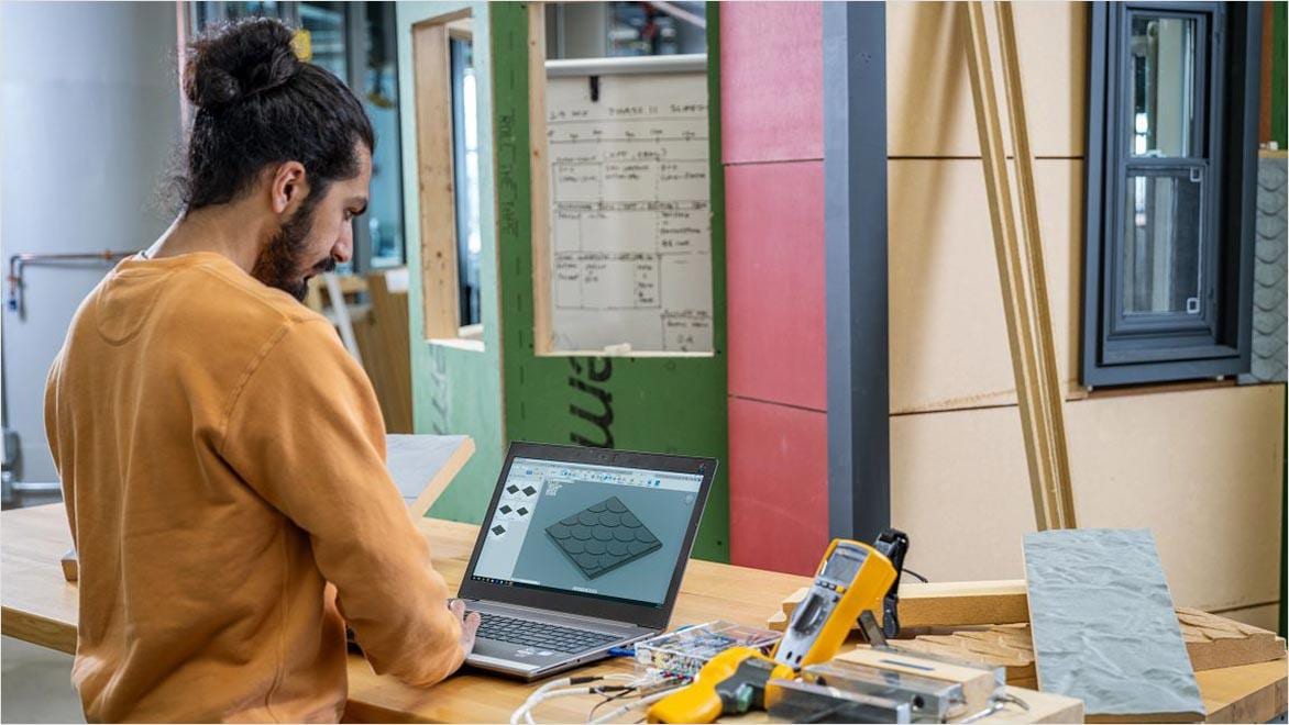 At the Autodesk Technology Center in Boston, HP Tech Outsight Network residents are shown working on their project.