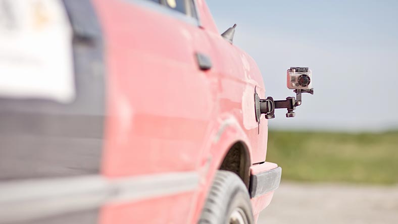 Camera on red sport car