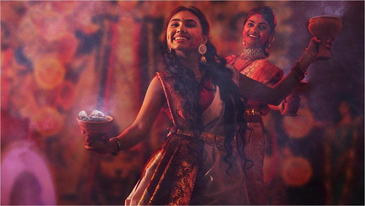 Bengali women performing dhunuchi dance on the occasion of Durga Puja