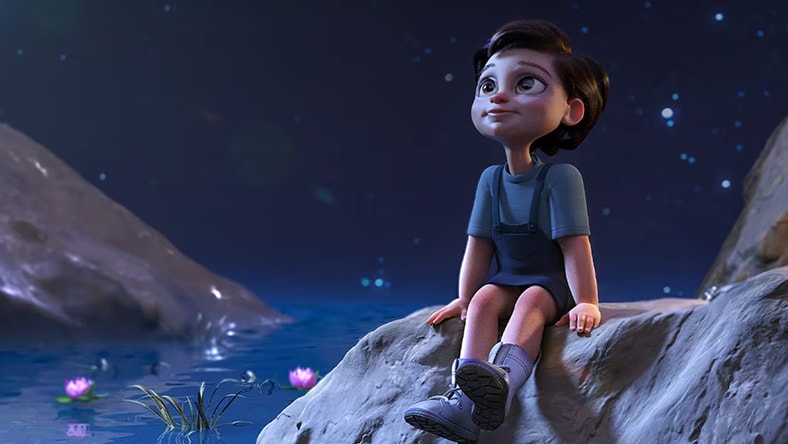 Young boy dangling feet over water and staring up at the sky