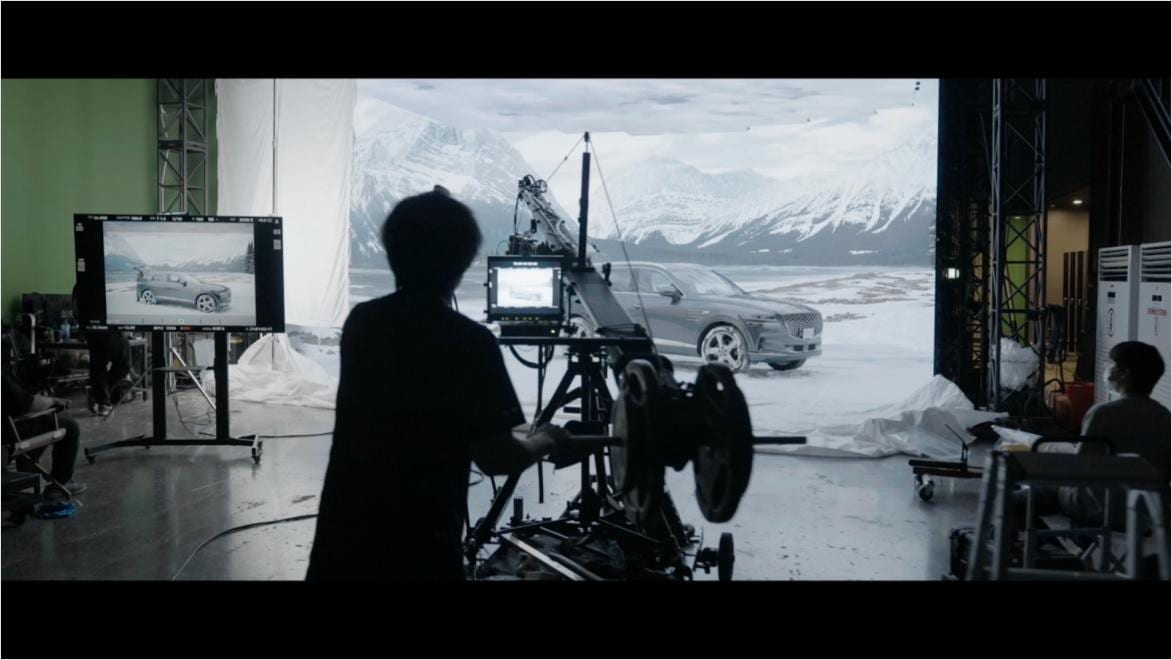 Special effects production set with camera operator in silhouette